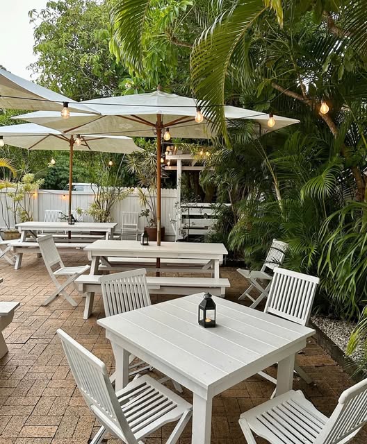 Garden Pizza courtyard with leafy plants and tables